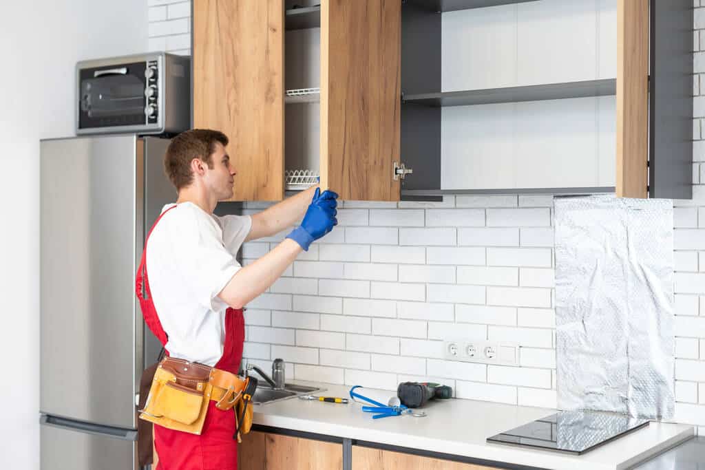 A man working on a kitchen renovation project
