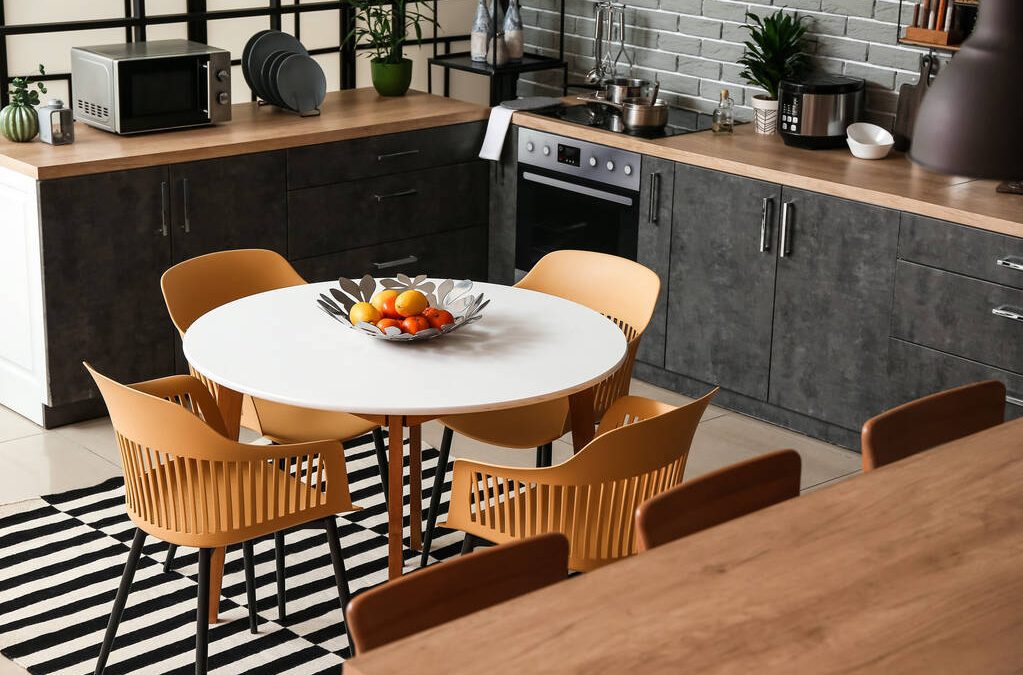 Interior of stylish modern kitchen with dining table