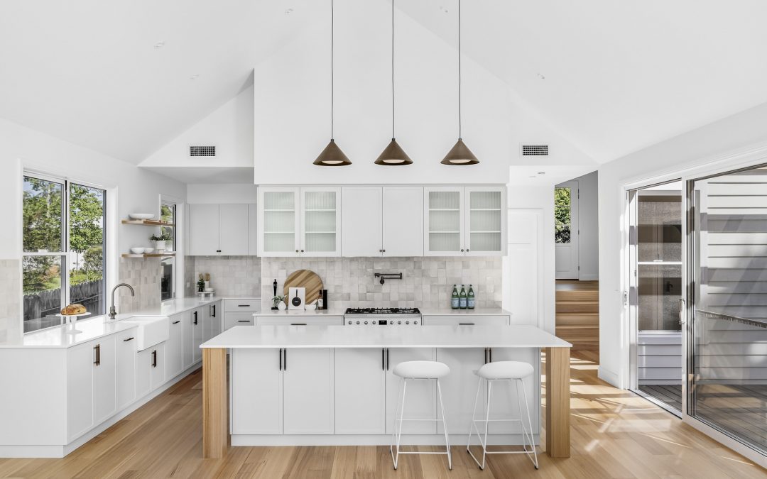 Modern timber kitchen cabinetry showcasing consistent wood grain direction across cabinet doors and panels.