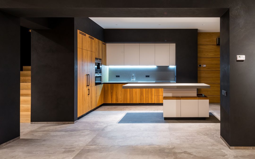 A modern house with a cantilevered kitchen island.